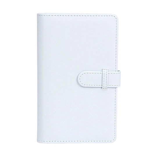 The Pocket Memoir – White Edition | Mini 3-Inch Polaroid Album by Polaroidelan Studios Holds 12 instant memories. Perfect for Fujifilm Instax Mini, Polaroid Go & more.